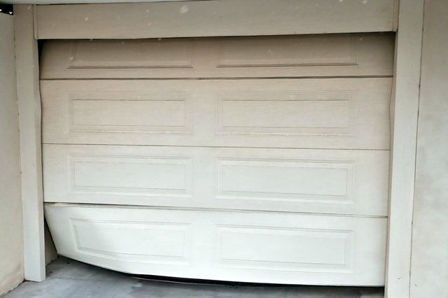 Garage door dent and panel repair in Perth