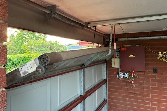 Off track garage door repair in Perth