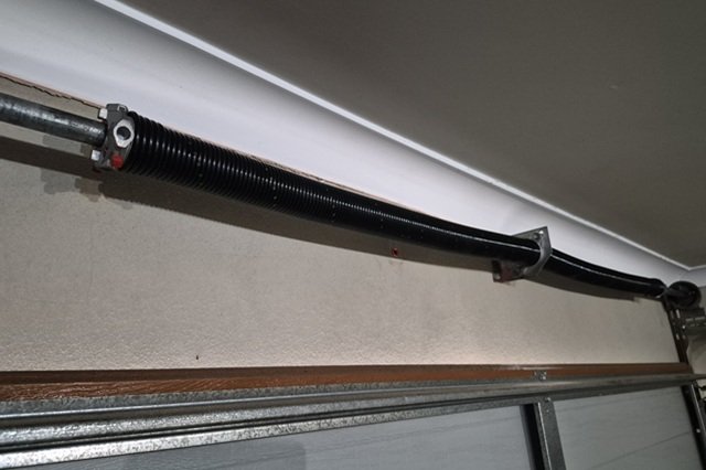 Garage door spring repair for a roller or sectional door in Perth