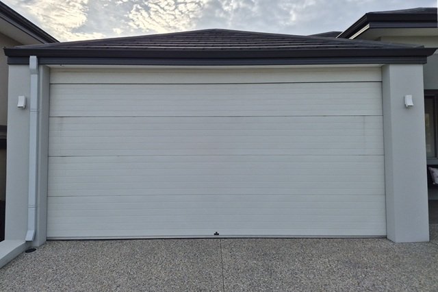 Sectional Garage Door Replacement (Before)